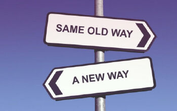 Sign post pointing to a new way or the same way