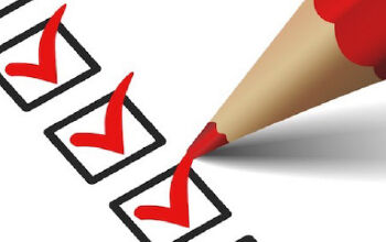 Red pencil checking all the checkboxes